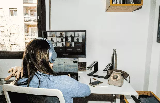 Digital Marketer Team member reviewing campaign performance on a laptop